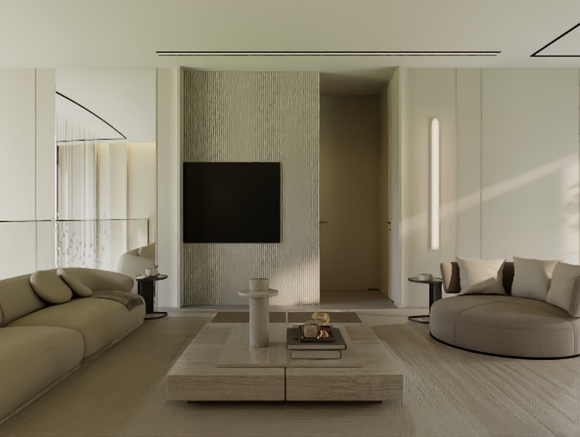 A living room with a wall-mounted screen on a ribbed stone panel, between a long sofa and a curved seat, designed by Radwa Interiors.