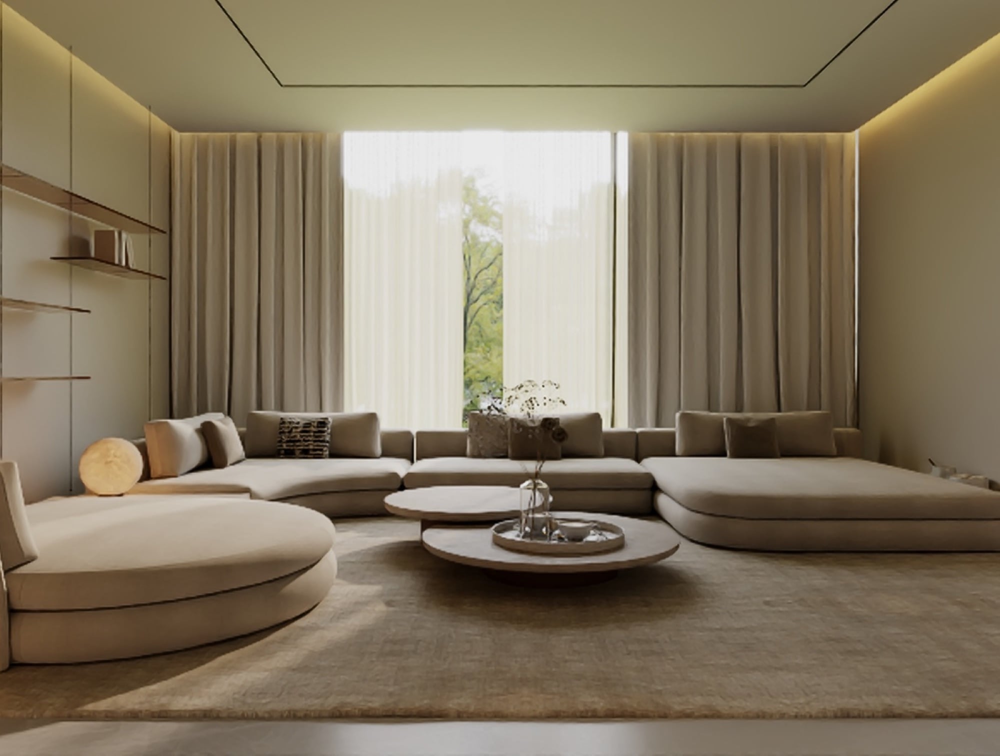 A sitting room with a long low sectional and a curved daybed on a soft rug, framed by full-height curtains, designed by Radwa Interiors.