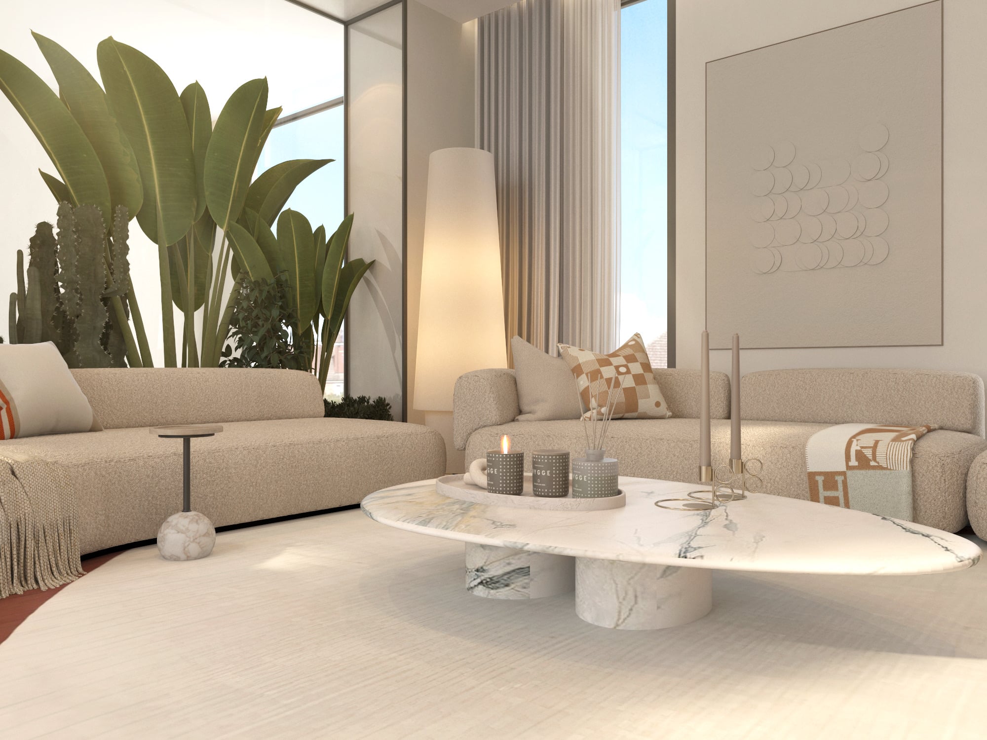 A seating area with cream sofas and a white marble oval table, beside tall strelitzia leaves behind glass, designed by Radwa Interiors.