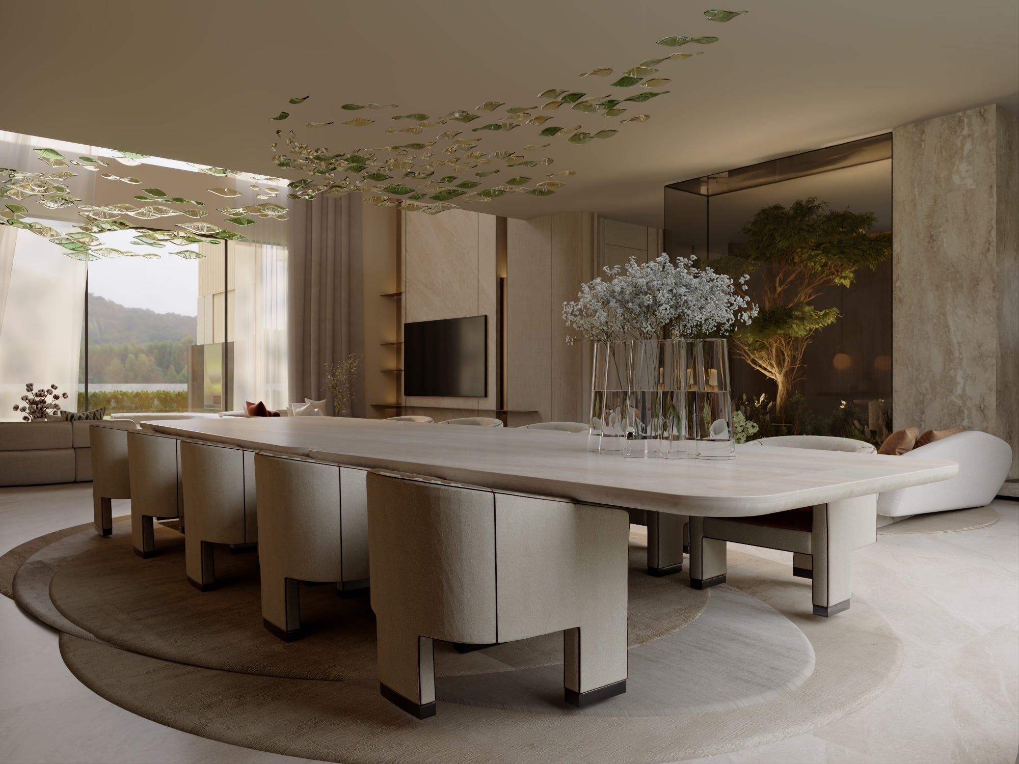 A long dining table with cream chairs and a full gypsophila arrangement, beneath a green leaf-glass ceiling piece, designed by Radwa Interiors.