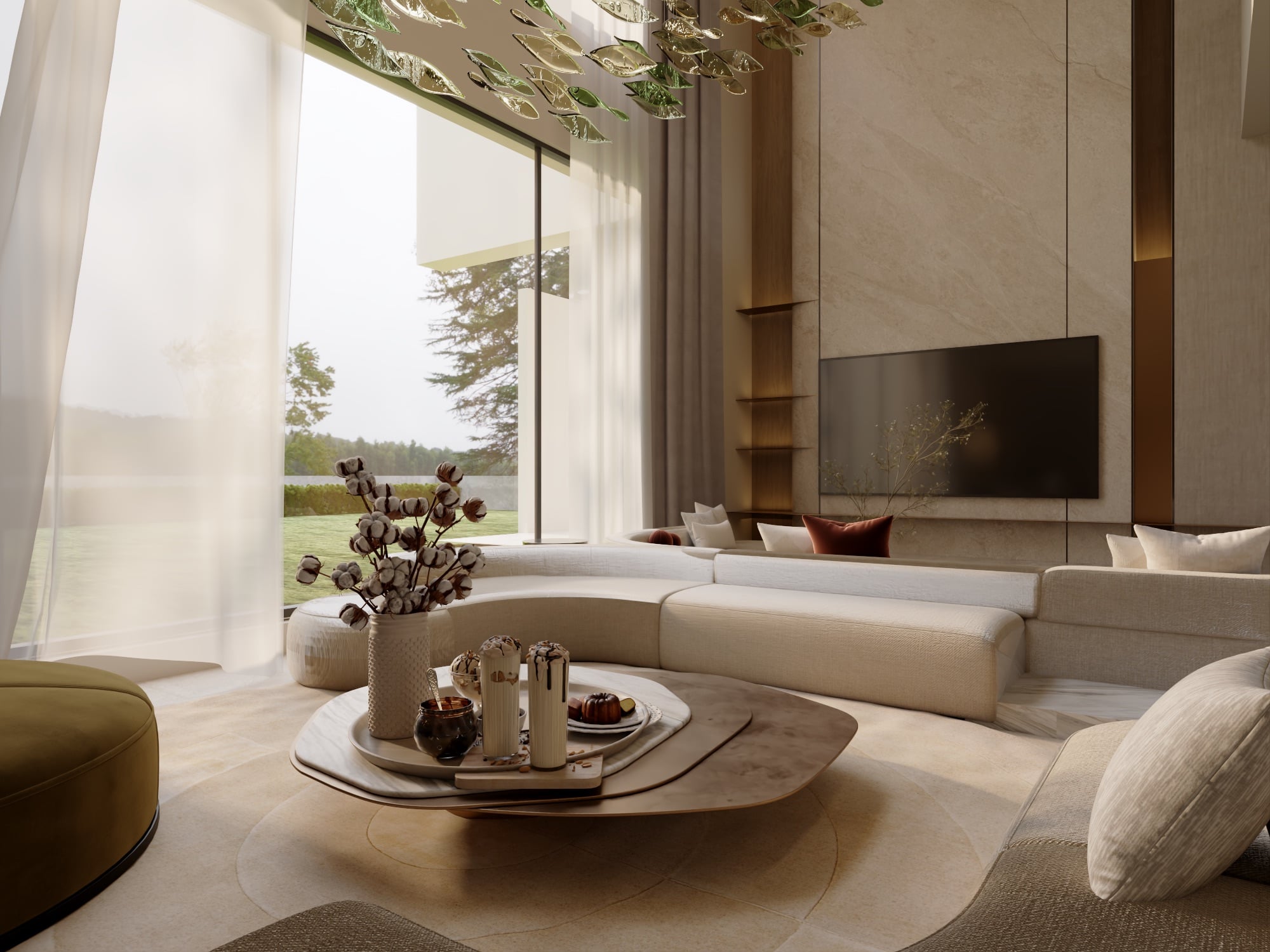A living room with curved cream seating around a layered stone table, facing a screen on a marble wall and parkland glazing, designed by Radwa Interiors.