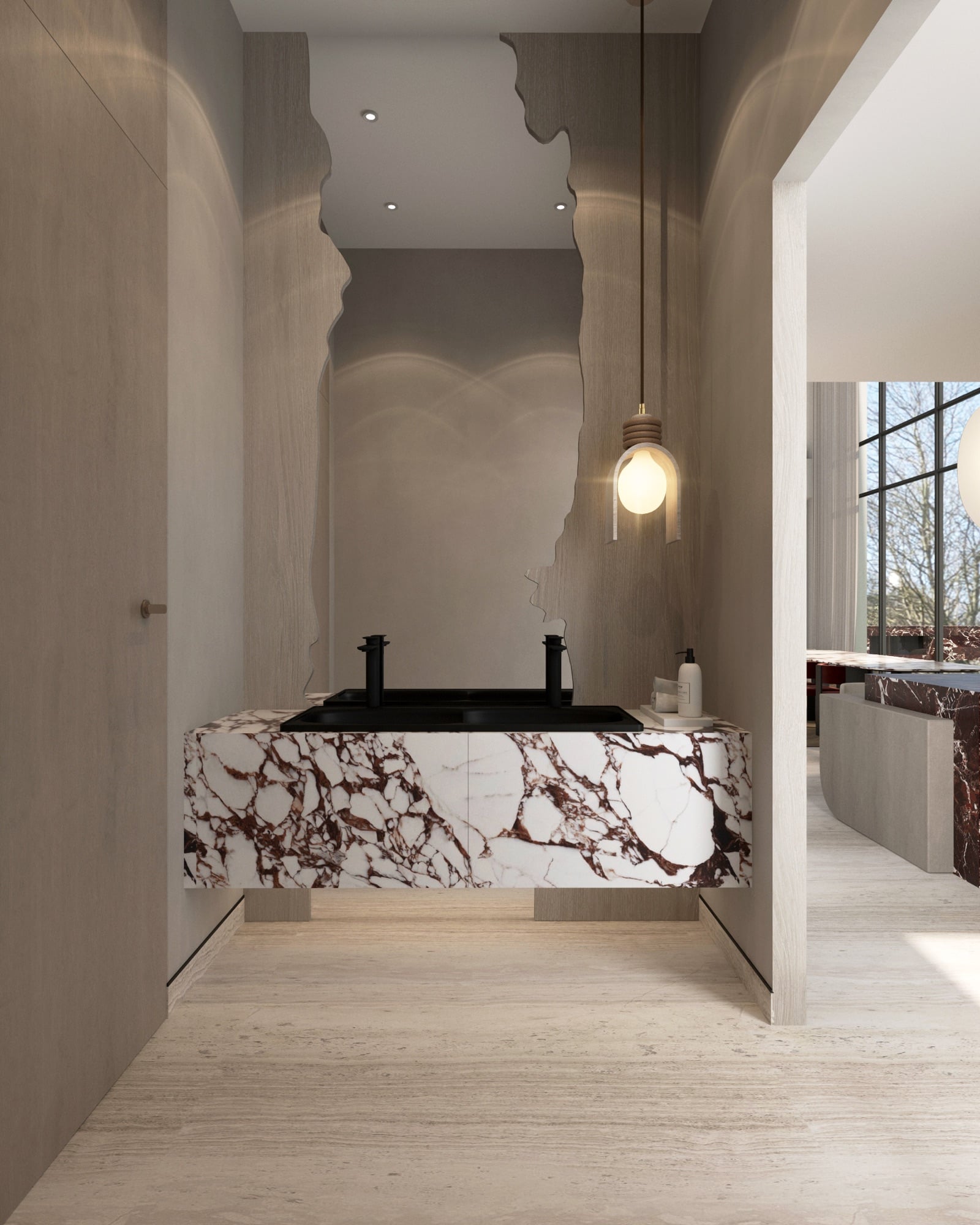 A washroom with a black basin set into a burgundy-veined marble vanity, under a glass globe pendant against a stone wall, designed by Radwa Interiors.