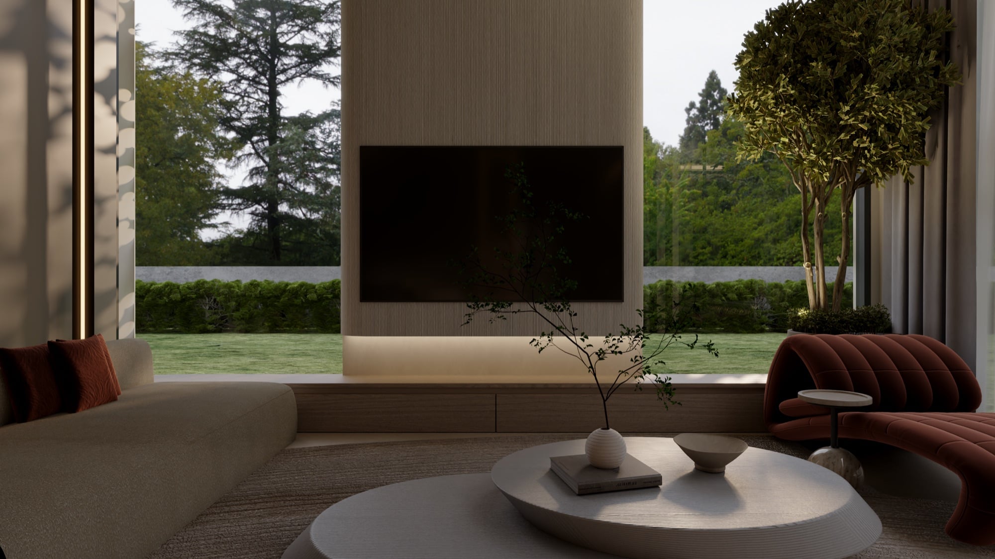 A living room with a wall-mounted screen on a timber panel, a rust velvet sofa and a low round table, open to the garden, designed by Radwa Interiors.