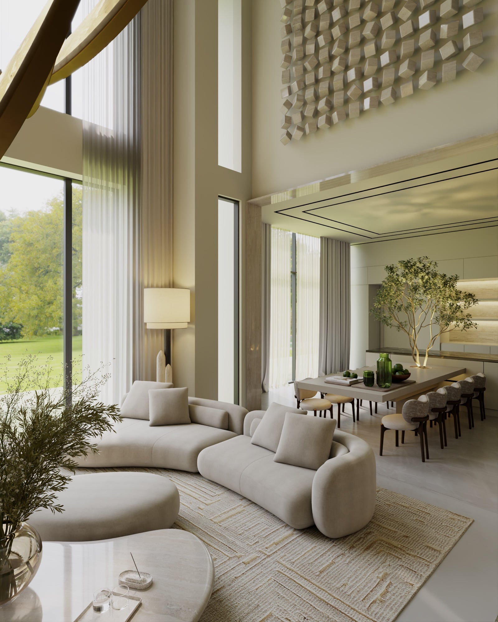 A double-height living room with cream seating below a sculptural wall installation, beside a dining table and an indoor tree, designed by Radwa Interiors.