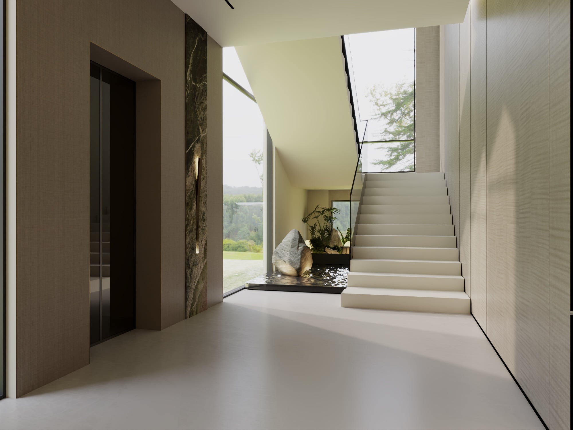 A hallway with a book-matched dark marble panel and lift doors, beside a staircase and a boulder in a water basin, designed by Radwa Interiors.
